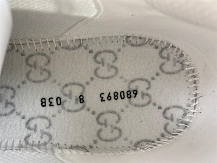 G*u*i sneakers