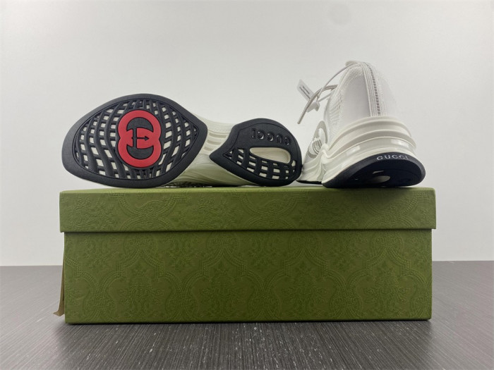 G*u*i sneakers